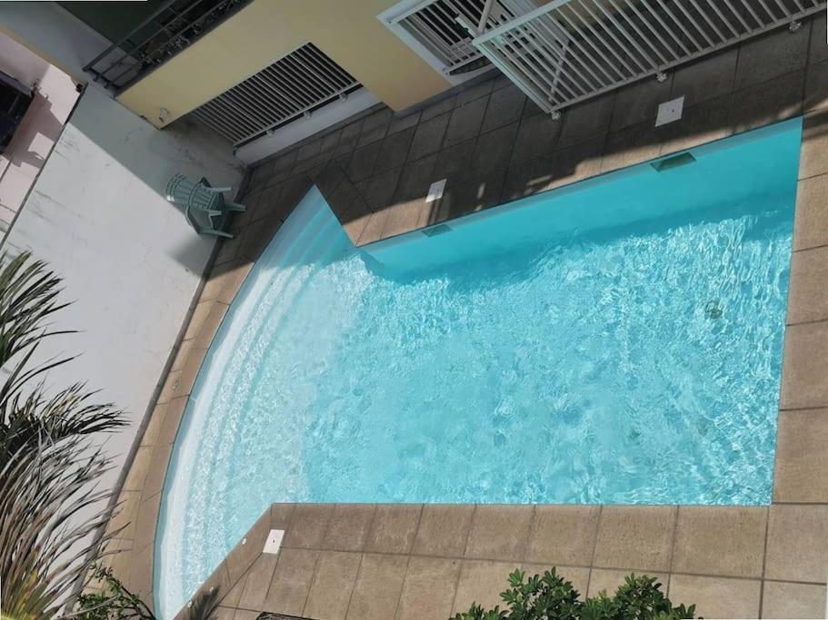 Jade - Appt 2 Chb - 4 Personnes - A 200 M Du Lagon De Saint-Pierre - Residence Avec Belle Piscine Et Parking Prive - Sur Le Front De Mer Et A 2 Pas Du Centre-Ville De St-Pierre Dış mekan fotoğraf